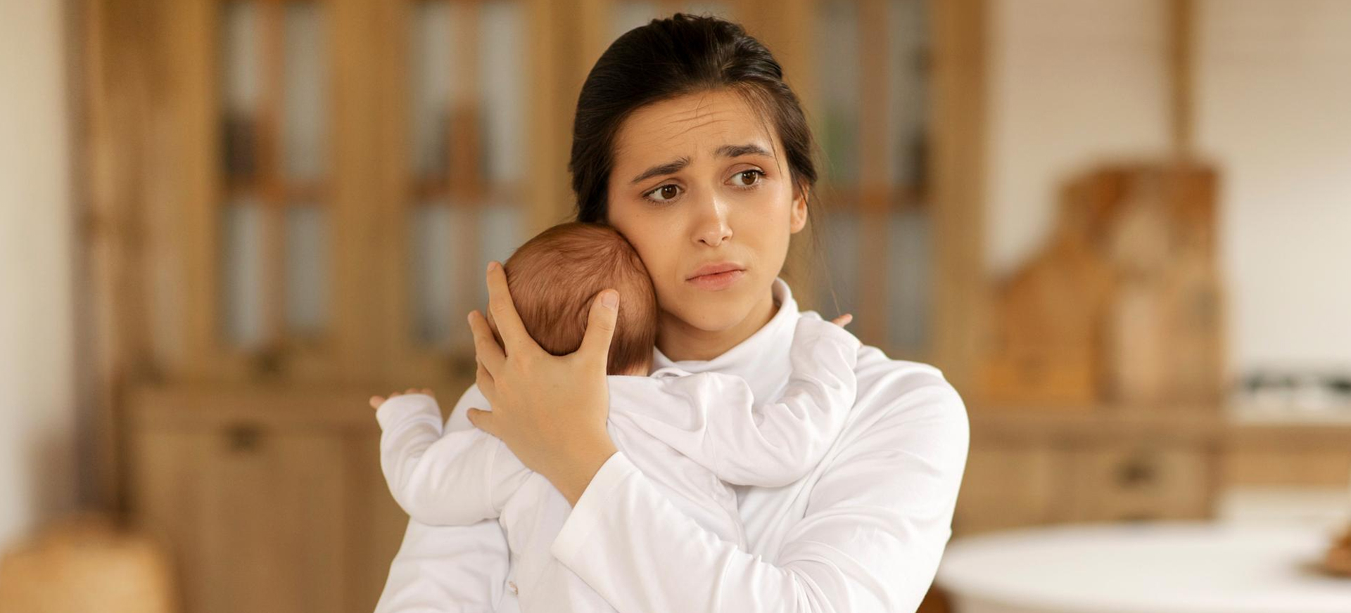 Postpartum Psychosis: Symptoms, Causes, and Treatment Options